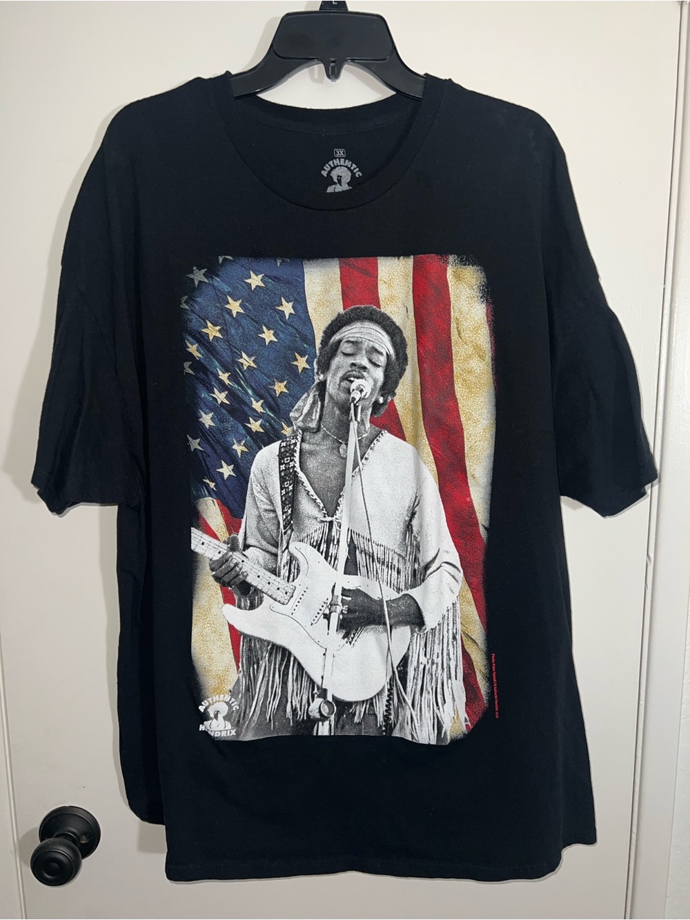 Black Short-Sleeve Men’s Graphic Tee with Musician and Flag Print